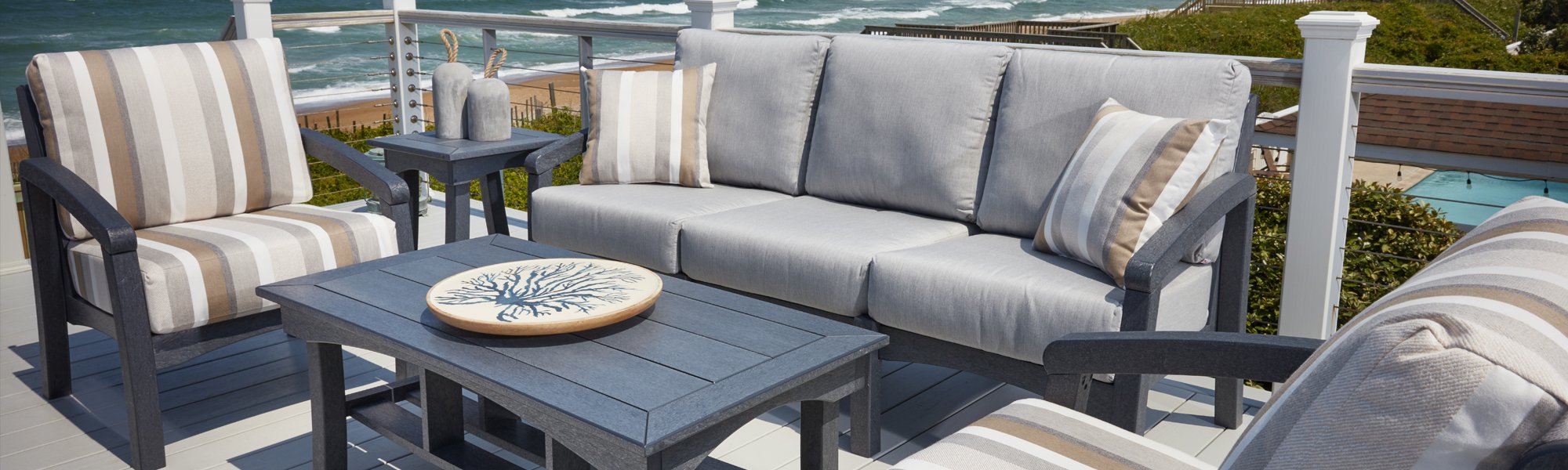 Banner shows an outdoor patio set by the ocean
